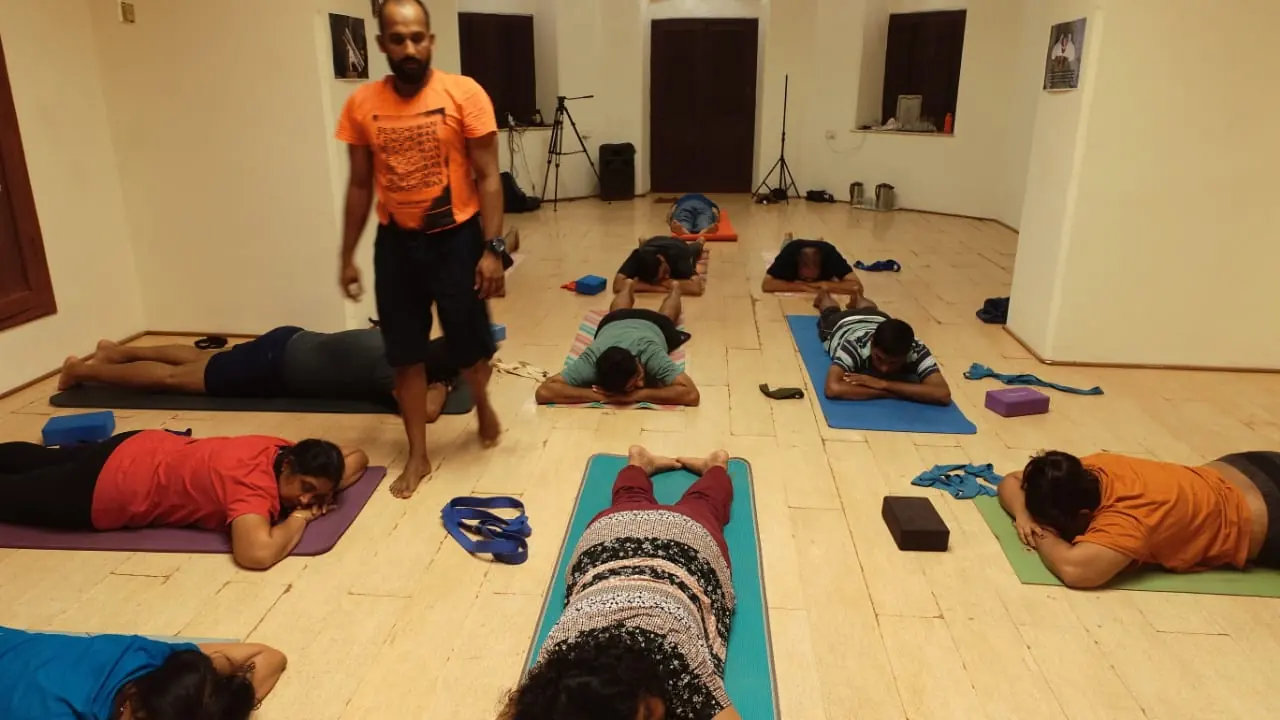 Abhilash Soman teaching a class inside the school at Kovalam.