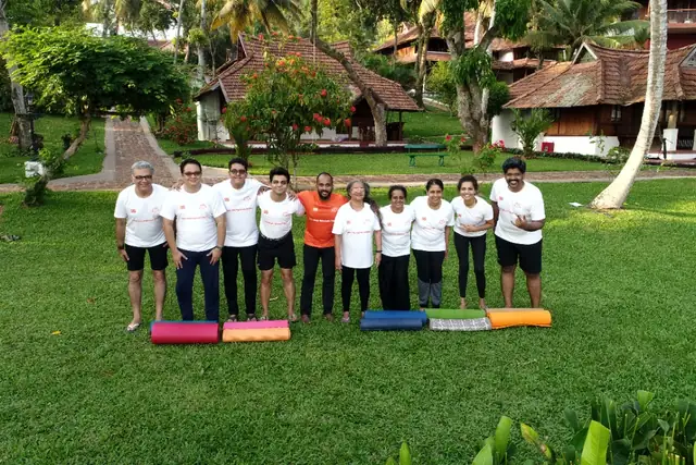 The group gathered together on the lawn after a session.